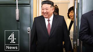 Kim Jong Un arrives in China in armoured train for military parade