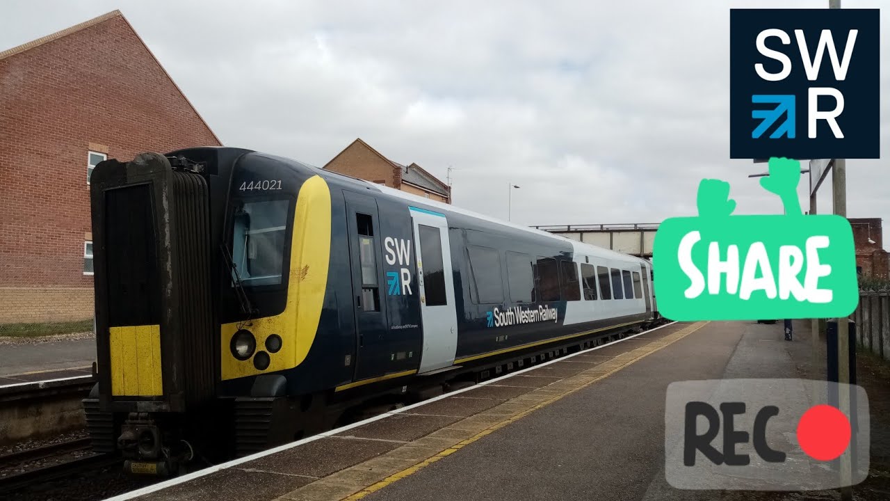 444021 departing Christchurch with a two-tone