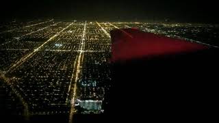 Flying over Chicago at Night