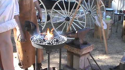 Colony Days - Blacksmith Working in Tent City