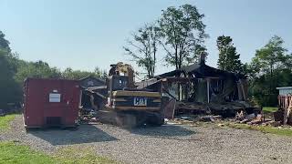 Watching the demolition of my dad’s house after he had a house fire this summer. September 17, 2022