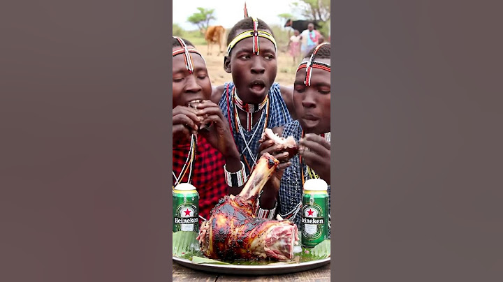 🔥 Hadzabe Tribe Grills Wild Meat & Drinks Heineken in Village Feast! 🍖🍺😳 #WildFoodMukbang