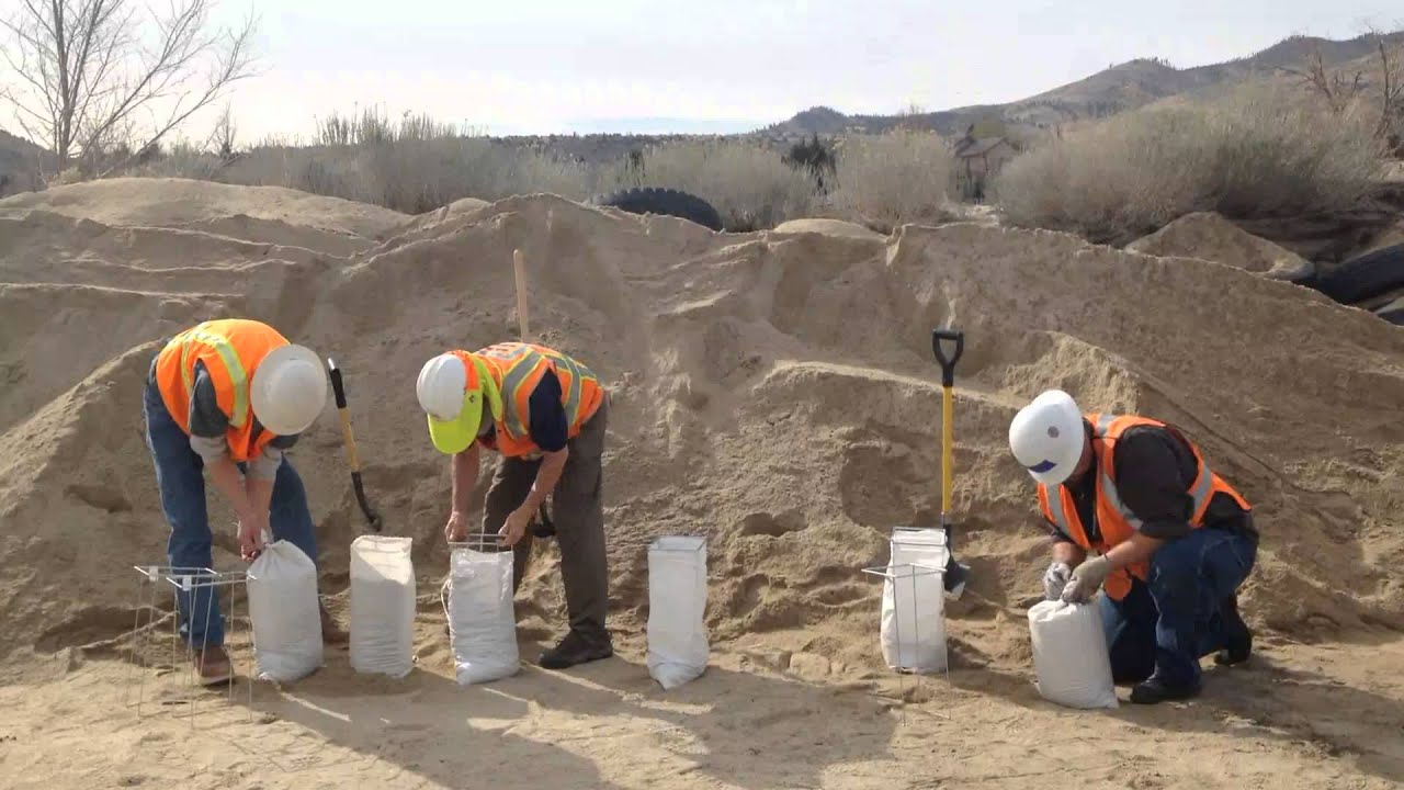 EZ Fill Sandbag Filler being used to fill sandbags by emergency workers