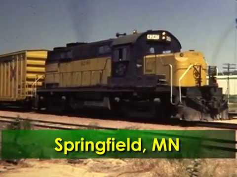 During the remarkable 147-year history of the Chicago and North Western Railroad Company from 1848 to 1995, the railroad fielded a variety of main line and branch line service throughout the Midwest and High Plains region, not to mention several locomotive types to move those trains. A secondary C&NW main line from Chicago ran northwest through Wisconsin, Minnesota, and South Dakota to Pierre, Dakota Territory in 1880. This route was finally completed across South Dakota to Rapid City in 1907. In the late 1970s, many American Locomotive Company units were based at Huron, South Dakota, due to their lightweight and pulling capacity. This specific suitability to the areas light rail and slow speeds established the Pierre to Winona route as the ALCO line. In this video, photographer Fred Crissey follows the ALCO Line between Winona, Minnesota and Pierre, South Dakota, from 1977 to 1981. Also included are the Plainview, Minnesota and Aberdeen to Huron, South Dakota branch lines. This program features awesome ALCO locomotives that include RS2, RSD4, RSD5, RS32, and C425 models along with EMD SD-7R and SD-9s. This is one part of the C&NW that was very unique, but short-lived. Let C. Vision bring these memories into your home for life!