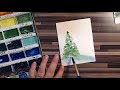 pine tree in watercolor with a fan brush Perfect for Christmas Cards