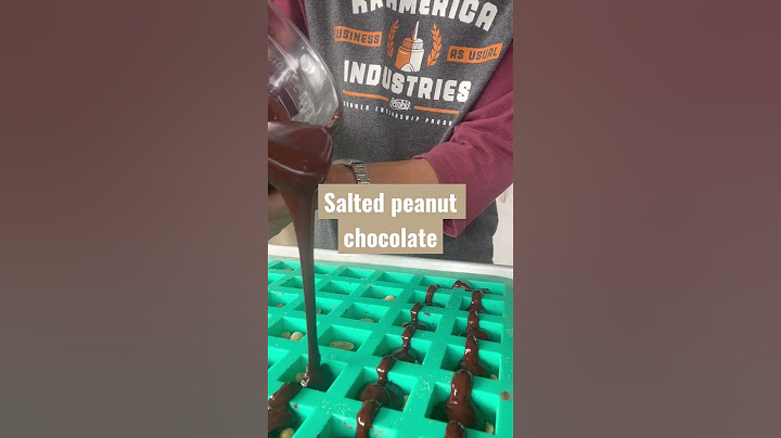 Love these mini bar silicone molds. Filled with salted peanuts and 85% chocolate.