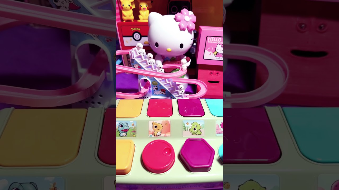 SATISFYING HELLO KITTY DANCING FIGURE with CUTEST HELLO KITTY COIN BANK 