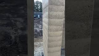 Removing insulation from rammedearth wall @EarthStructures #earthbuilding #eco @RedEarthRanch