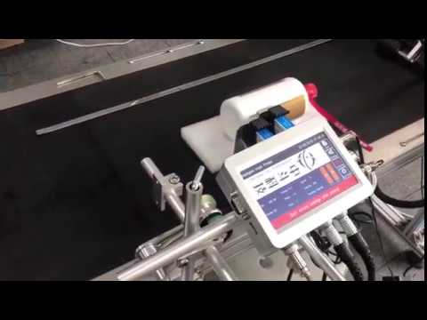 How to print label on ceramics liquor bottle with red Ink by Meenjet Mx2 Coding Machine?