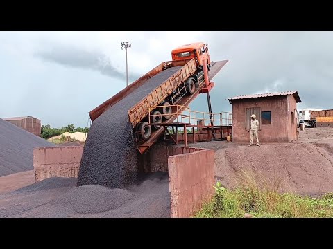 hydraulic truck tippler; unloading iron ore pellets | ab heavy