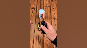 Stun grenade stress-relief shell-ejecting toy