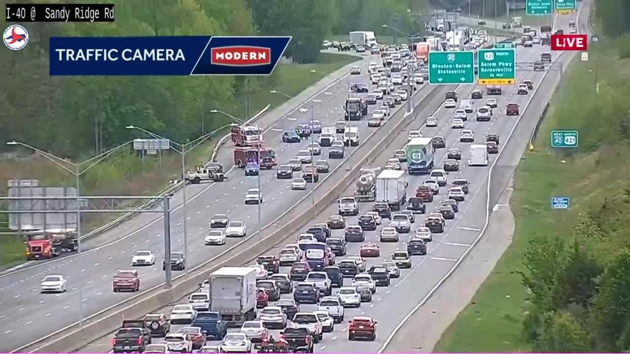 I40 crash closes eastbound lanes near Sandy Ridge Rd, slows rush hour