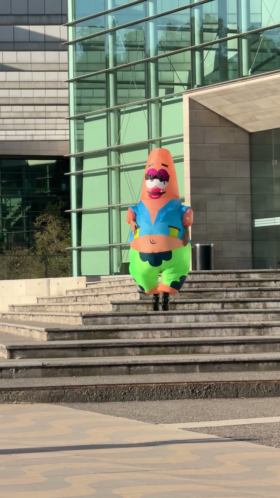 Yassified Patrick Cosplayer in Heels Takes a Tumble Down the Stairs