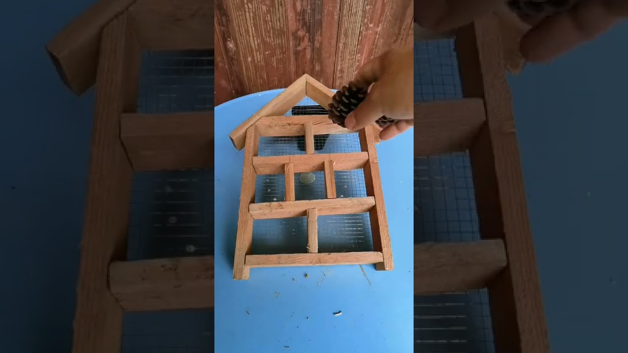 Self made insect hotel in small rural courtyard