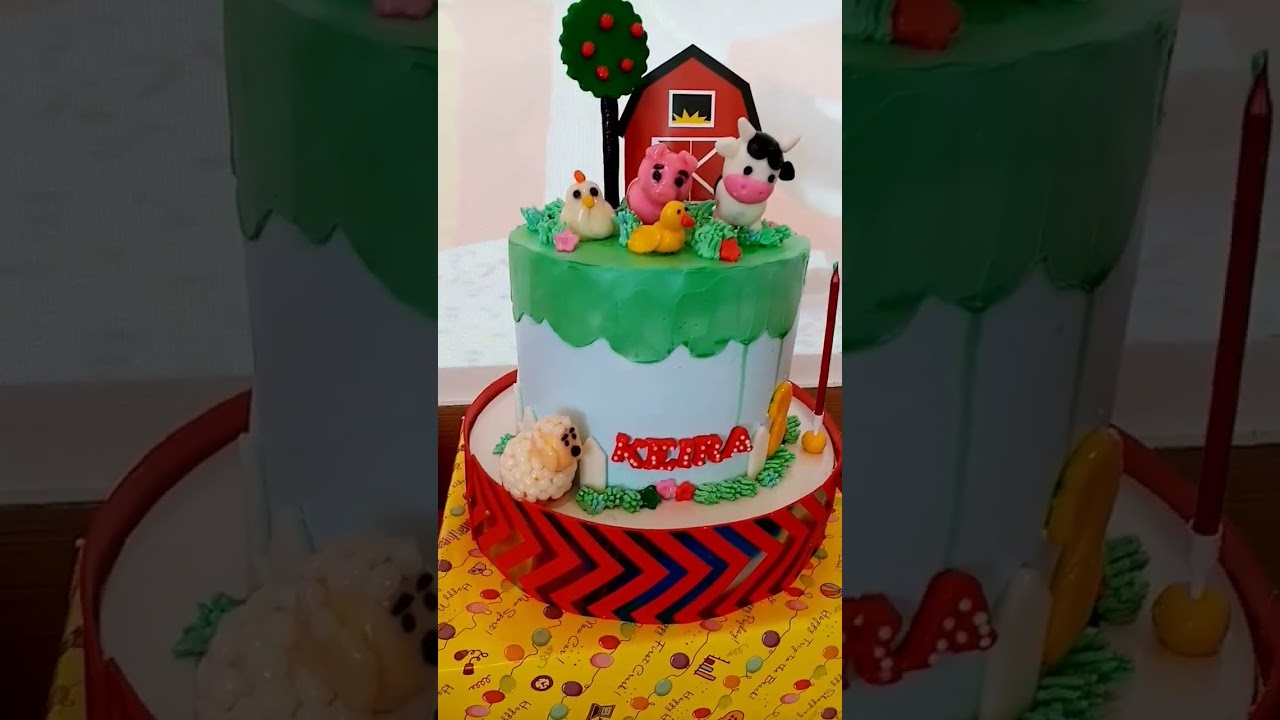 animal farm theme cake... chocomoist cake with Whipping cream icing... size 8x4 with 12pcs cupcakes.
