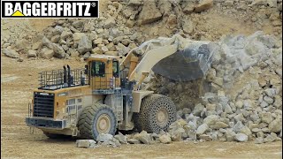 Komatsu WA800 wheel loader feeding huge O&amp;K mobile crusher - with sound!