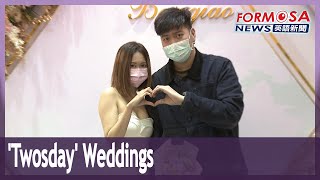 Couples rush to tie the knot on ‘Twosday’