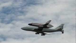 Space Shuttle Discovery Flies Over the National Mall