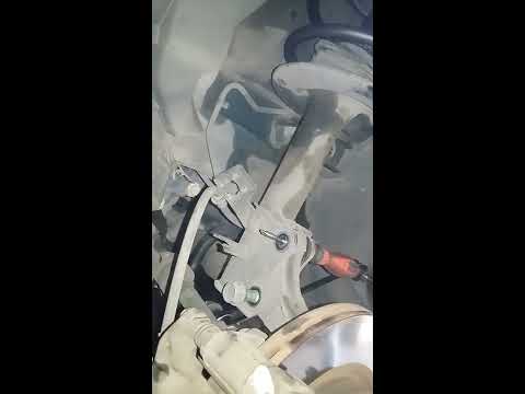 How to replace front strut assembly Nissan Sentra