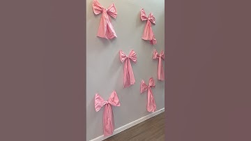 We Made this bow wall using dollar tree table cloths 🎀 #diy #dollartree #dollartreehacks #coquette