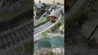 Ambling through The Victorian station a class 150 Sprinter.