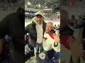 Biz spotted a guy in the crowd with a Bissonnette Coyotes jersey, went down, and gave him a beer