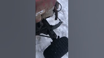 Straight piped mud mower shooting flames!