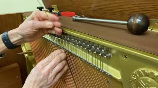 Replacing a bass string on a vertical piano