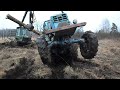 John Deere 810D stuck in mud, saving with T-40AM tractor