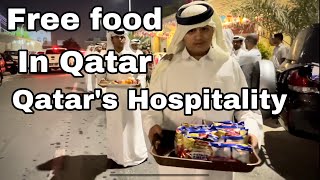 Free food in Qatar |Qatari people serving free food to fifa fans, public|fruits,snacks,water,tea