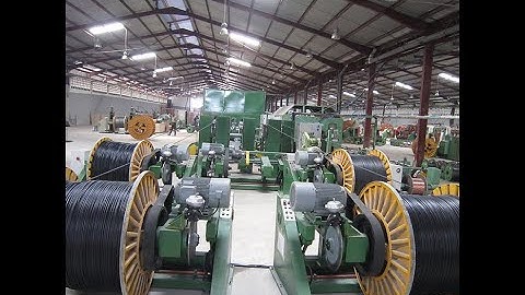 Automatic bobbin uploading and downloading for bow stranding machine