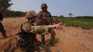 Marines dig in during a company defense range at Camp Grayling, Michigan