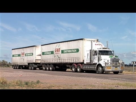 Various views of singles, B-Double, B-Triple, and some road trains around the Port Augusta area. I never managed to get a triple Road Train, each time I went out the Darwin road and waited, nothing turned up. But when I was driving out and couldn't stop, they went past.