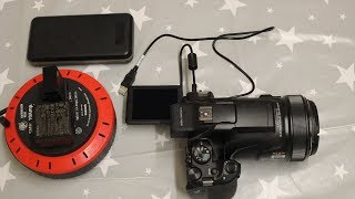 How to use a Nikon P1000 while charging it