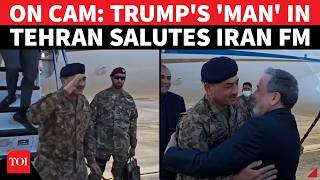 On Cam Trumps Favourite General Lands In Tehran Salutes Khamenei Aide Araghchi, Gets Tight Hug