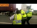 Three traffic police officers caught on camera beating up a car driver