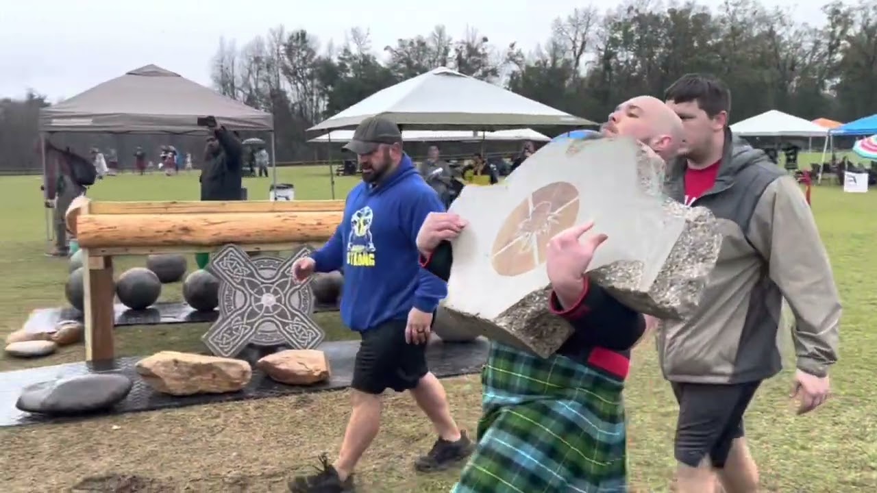 J.T. McNeil wins the novice “Stones of Strength” competition at the Tallahassee Highland Games.