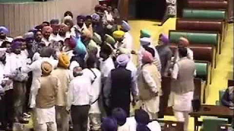 Congress MLAs throwing books at Punjab Speaker