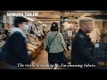 While the world rushes by, I choose fabric.