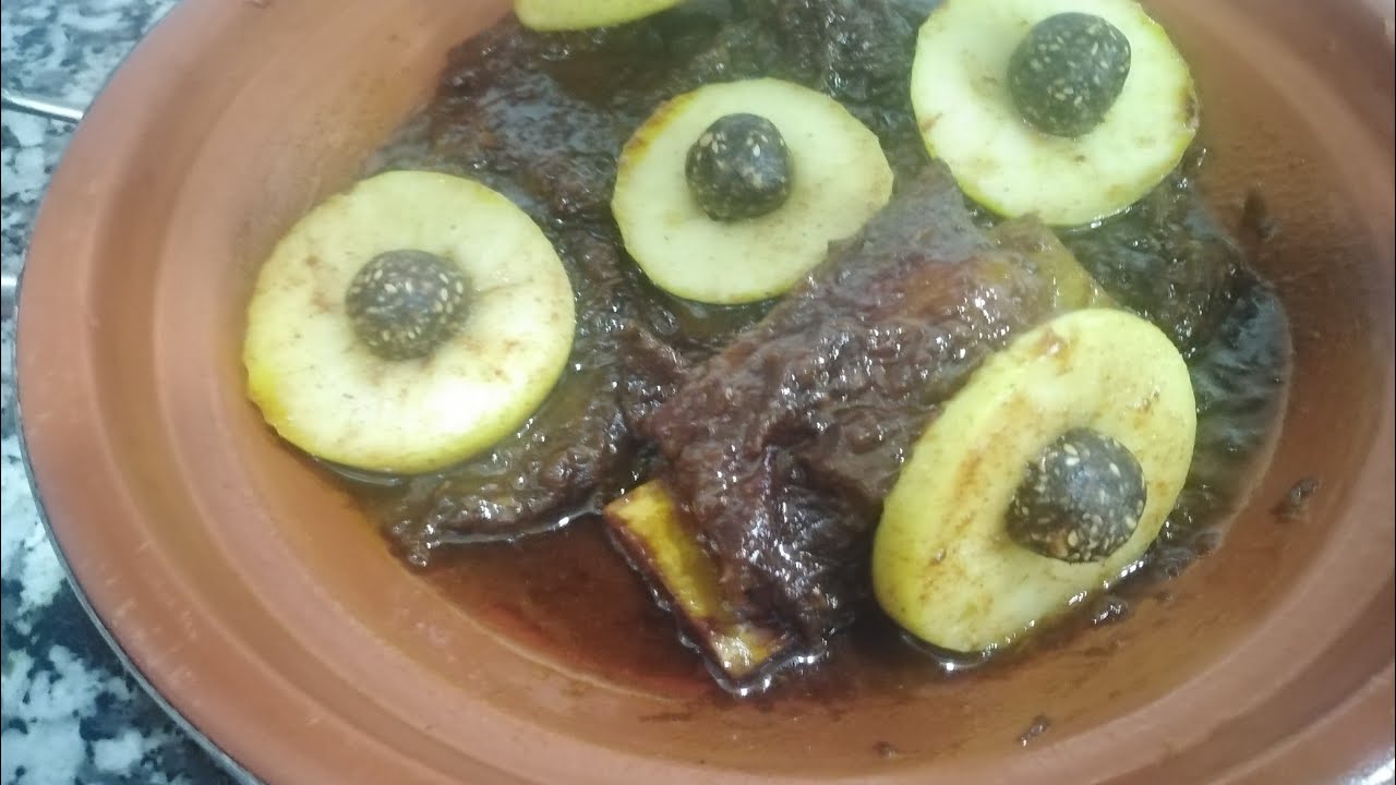 طاجين اللحم بعصير البرتقال و كليكوز والتفاح معسل