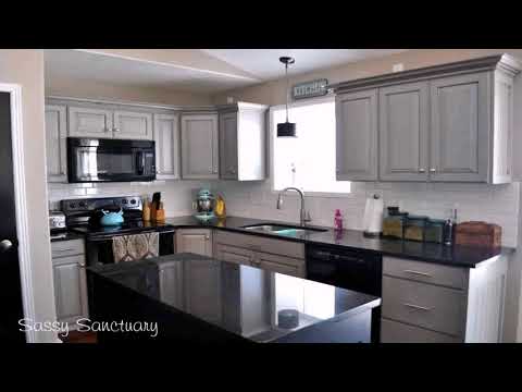 kitchen-with-grey-cabinets-and-black-appliances---gif-maker--daddygif.com-(see-description)