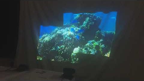 Scalable and view-independent calibration of multi-projector display for arbitrary uneven surfaces