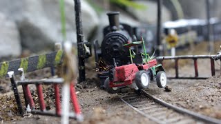 Rail King Steam Train Hits Tractor in railroad crossing