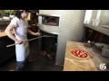 Chef at rosalie whipping up pizzas at a dizzying pace