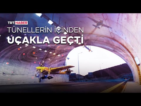 Tünellerin içinden uçakla geçti