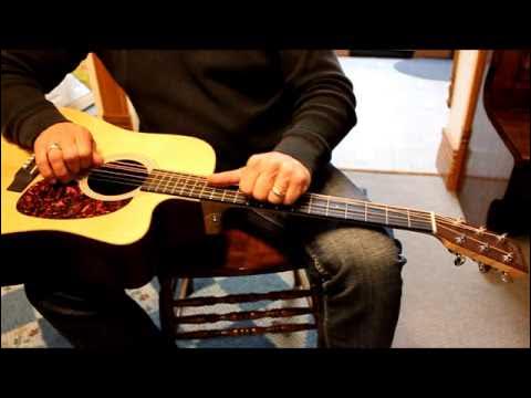 Easy Way To Stretch Guitar Strings - YouTube