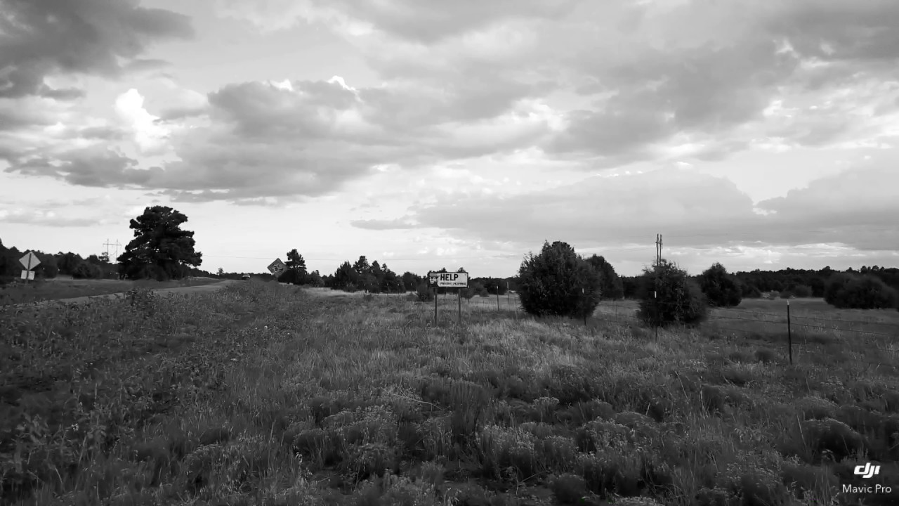 Smokey The Bear Sign. Drone flight near Rowe, NM