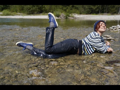 Wetlook - Laura in river with Superga, jeans and sweater