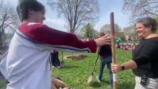 Planting a tree in honor of Mr. John