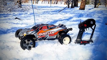 TRAXXAS RUSTLER RC CAR JUMPS SNOW! (MADE OUT OF SNOW) PART 1